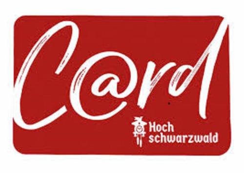 a red coca cola logo on a red label at H&P Touristik Residenz Grafenmatt GRA-1-1 in Feldberg