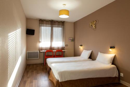 Ένα ή περισσότερα κρεβάτια σε δωμάτιο στο Auberge de jeunesse HI Bordeaux-Blanquefort