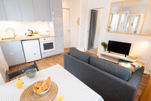 Kuchyňa alebo kuchynka v ubytovaní Appartement T2 neuf, cosy & tout confort - Proche Centre ville par Groom