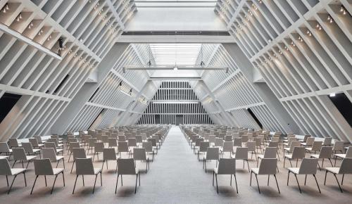 a large room with rows of chairs in it at Hyatt Regency Zurich Airport Circle in Kloten