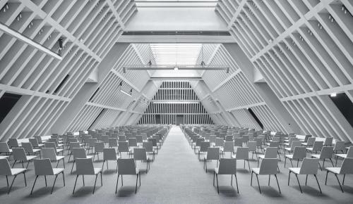 a large room with rows of chairs in it at Hyatt Regency Zurich Airport Circle in Kloten