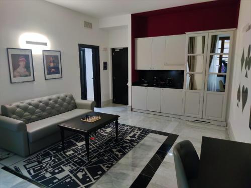 a living room with a couch and a table at Casual Rinascimento Firenze in Florence