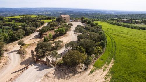 an aerial view of a dirt road in a field at Catalunya Casas Fabulous Villa for 28 with Heated Pool in Torá de Rulbregos