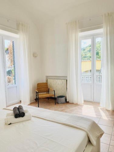 Postel nebo postele na pokoji v ubytování Villa Nolelu