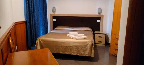 Posteľ alebo postele v izbe v ubytovaní In Rome