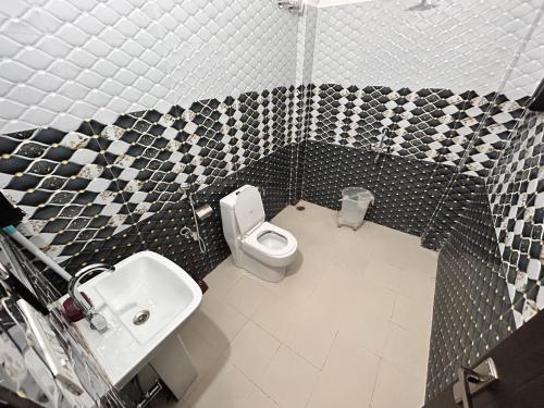 Phòng tắm tại HOTEL HIMALAYAN FOXHOLE