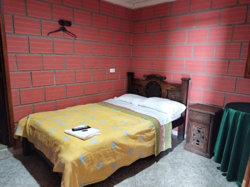 Postel nebo postele na pokoji v ubytování Casa Hotel Los Faroles- Samaná/Caldas