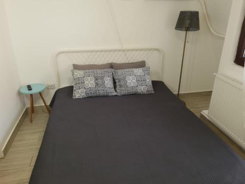 Ένα ή περισσότερα κρεβάτια σε δωμάτιο στο Stay In Tmisoara