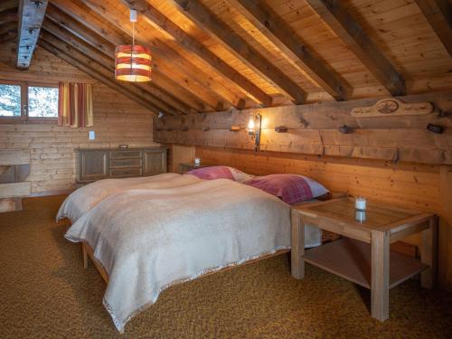 Postel nebo postele na pokoji v ubytování Chalet Mélanie by Interhome