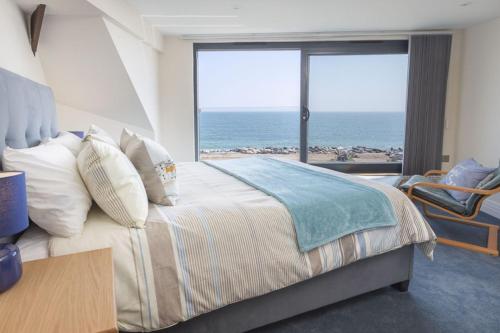 Katil atau katil-katil dalam bilik di Beesands Vista