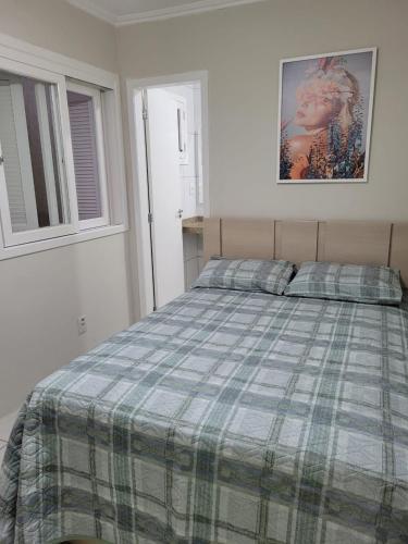 Katil atau katil-katil dalam bilik di Excelente Casa Duplex em Tramandaí