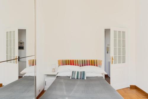 Кровать или кровати в номере Aquaeductus Apartment