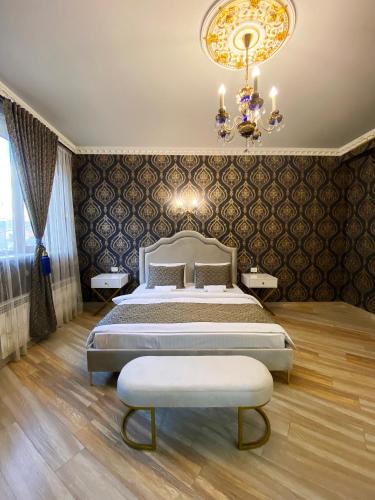 Postel nebo postele na pokoji v ubytování Shirbakyan Boutique Hotel & Apartments