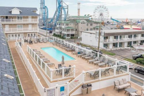 a view of an amusement park with a pool and a roller coaster at Impala Suites in Ocean City