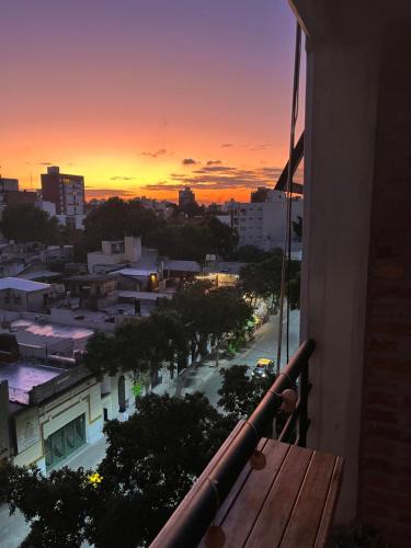 a view from a balcony of a city at sunset at Alójate en Pichincha Dpto completo en el corazón de Pichincha, el barrio mas lindo de Rosario in Rosario