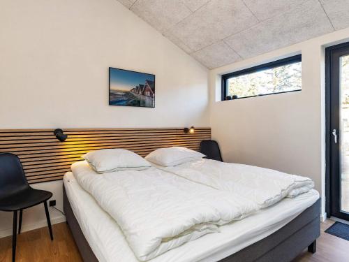 Postel nebo postele na pokoji v ubytování Holiday home Jerup LV