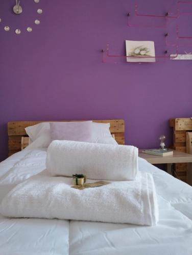 Ein Bett oder Betten in einem Zimmer der Unterkunft Ferula loft