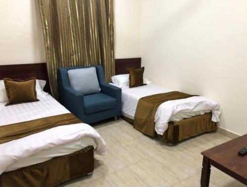 Кровать или кровати в номере sama alsadah