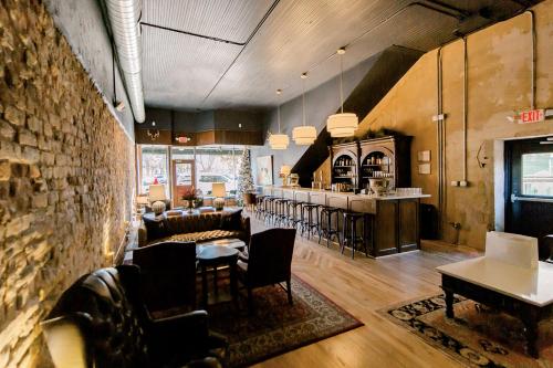 a lobby with a bar and a dining room at The Middleton Hotel in Graham