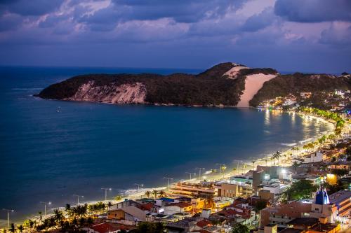 - Vistas a la ciudad y a la playa por la noche en PARADISE FLAT NATAL APT. 405, en Natal