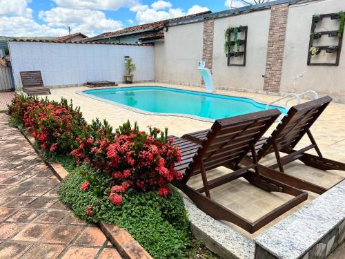 Bazén v ubytování Hotel Pousada das Flores nebo v jeho okolí