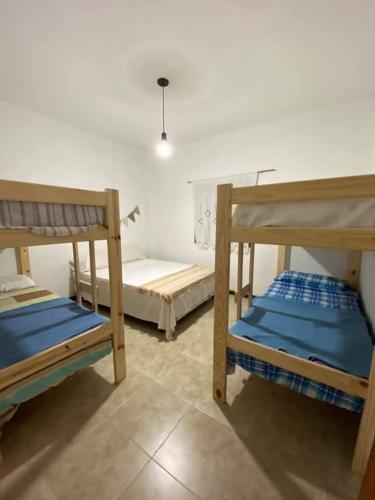 a room with two bunk beds in a room at Camino al Sol Domselaar wifi in Domselaar