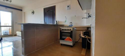 Kuchyň nebo kuchyňský kout v ubytování Ain Sokhna sea view