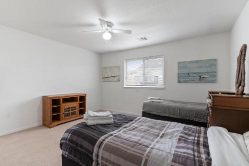 A bed or beds in a room at King Bed, Garage and Free Parking, Walkout Deck KMN1212