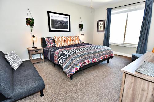 Postel nebo postele na pokoji v ubytování Entrada at Moab 428