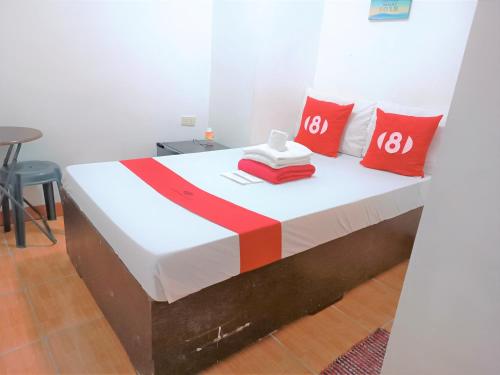 Una cama o camas en una habitación de 8Hostel