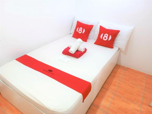 Una cama o camas en una habitación de 8Hostel