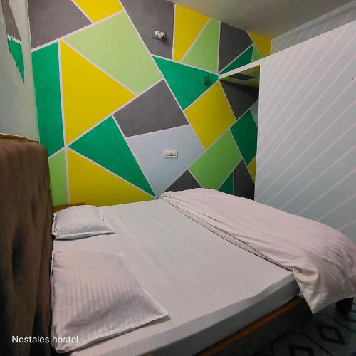 Katil atau katil-katil dalam bilik di Nest Tales Backpacker Hostel