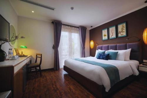 Letto o letti in una camera di Hotel Emerald Waters Classy