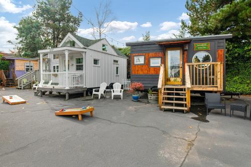 a tiny house is parked in a parking lot at Tiny Digs - Hotel of Tiny Houses in Portland