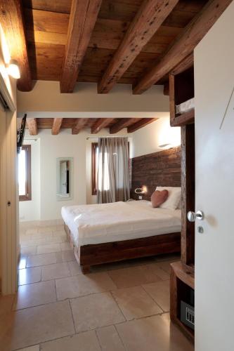 Ένα ή περισσότερα κρεβάτια σε δωμάτιο στο Hotel Antica Abbazia