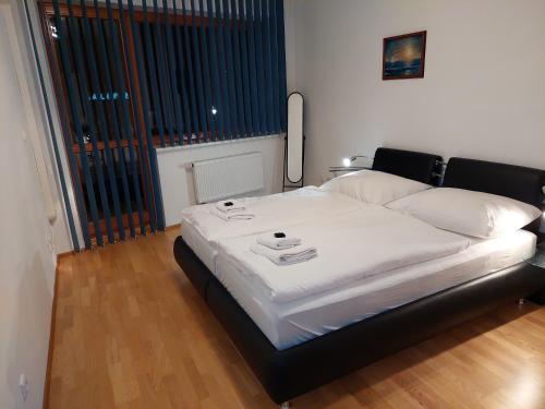 Postel nebo postele na pokoji v ubytování Appartement LARA SPA Čeladná