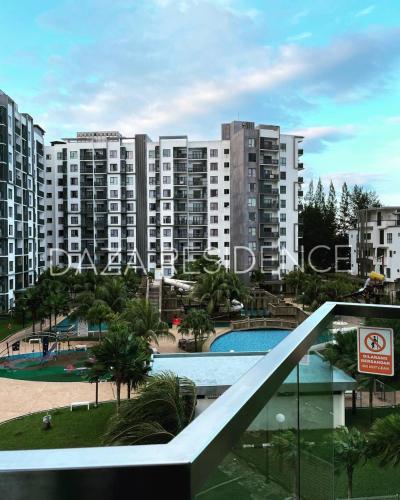 a view of a large apartment complex with a swimming pool at DAZA RESIDENCE @ TIMURBAY SEAFRONT KUANTAN in Kuantan