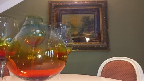 a group of wine glasses sitting on a table at Hotel Bílá Paní in Jindrichuv Hradec