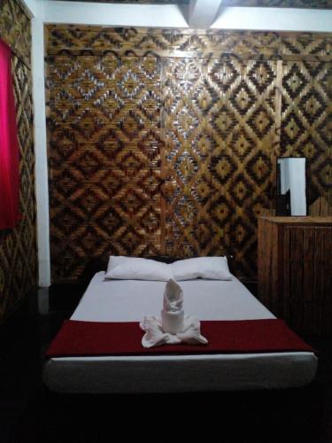 Katil atau katil-katil dalam bilik di Nine Clouds Homestyle Accommodation