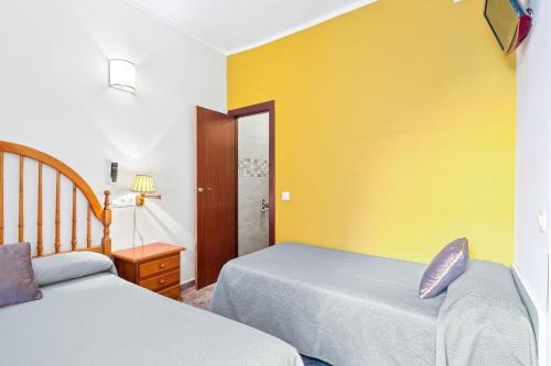 Katil atau katil-katil dalam bilik di Hostal Santa Ana