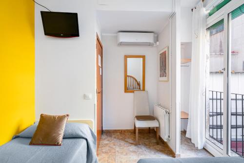 Katil atau katil-katil dalam bilik di Hostal Santa Ana