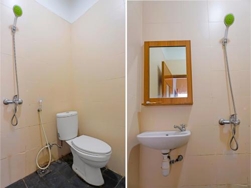 a bathroom with a toilet and a sink and a mirror at SPOT ON 92186 Penginapan Lorra in Nagoya