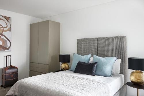 Ein Bett oder Betten in einem Zimmer der Unterkunft Punthill Parramatta