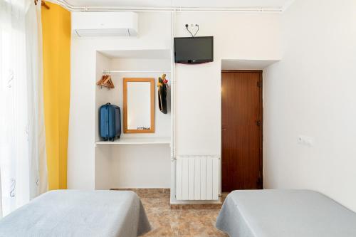 Katil atau katil-katil dalam bilik di Hostal Santa Ana