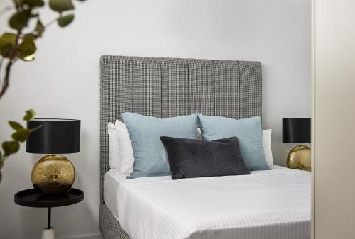 Ein Bett oder Betten in einem Zimmer der Unterkunft Punthill Parramatta