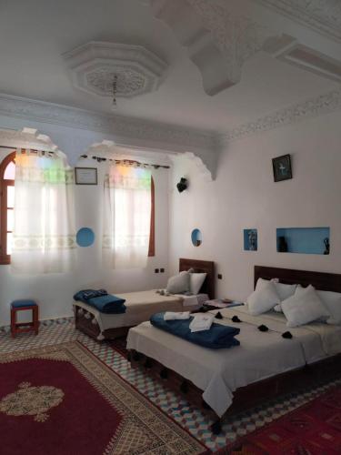 Riad dar Ahlamにあるベッド