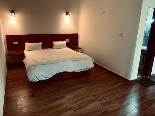 Cama o camas de una habitación en The Mamta Courtyard Anjuna