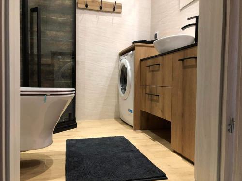 Φωτογραφία από το άλμπουμ του Apartament Amelia σε Ζάμοστς