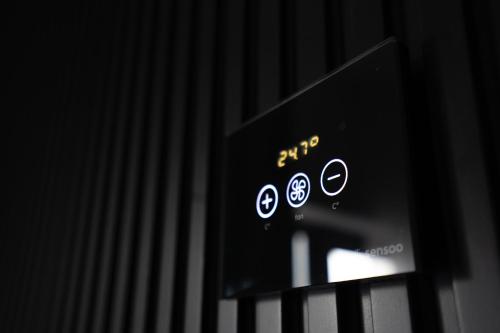 a close up of an electronic device with icons on it at Hotel Cristal in Cluj-Napoca