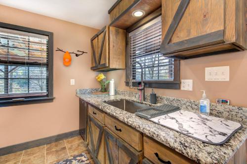 a kitchen with a sink and a counter at Rio House Retreat in Tazewell